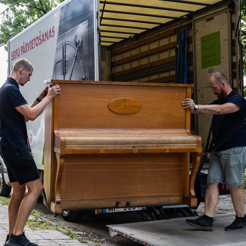 AVECTOR Group movers providing heavy furniture and piano relocation services.