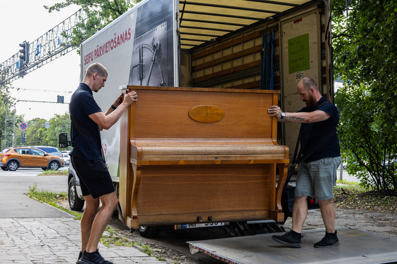 AVECTOR Group providing expert piano moving and heavy furniture relocation services.